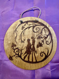 Holding Hands Under the Branches woodburning plaque
